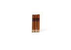 Byron Elegantes three cigars front at Cigar Club Miami